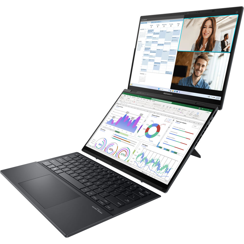 A side view of an open and powered on laptop with two screens and the keyboard placed near the bottom.