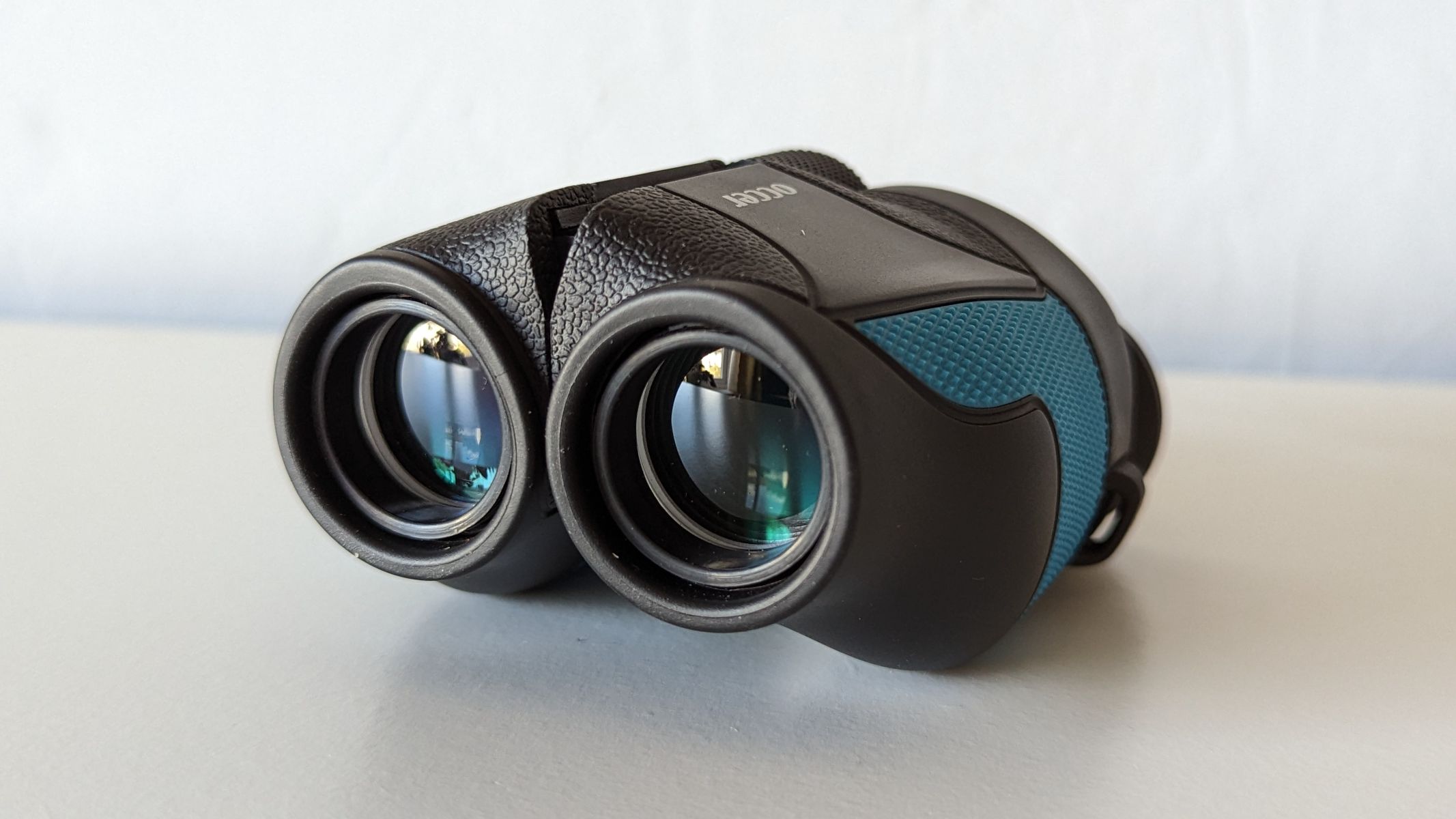 Occer 12x25 binoculars close-up of objective lenses