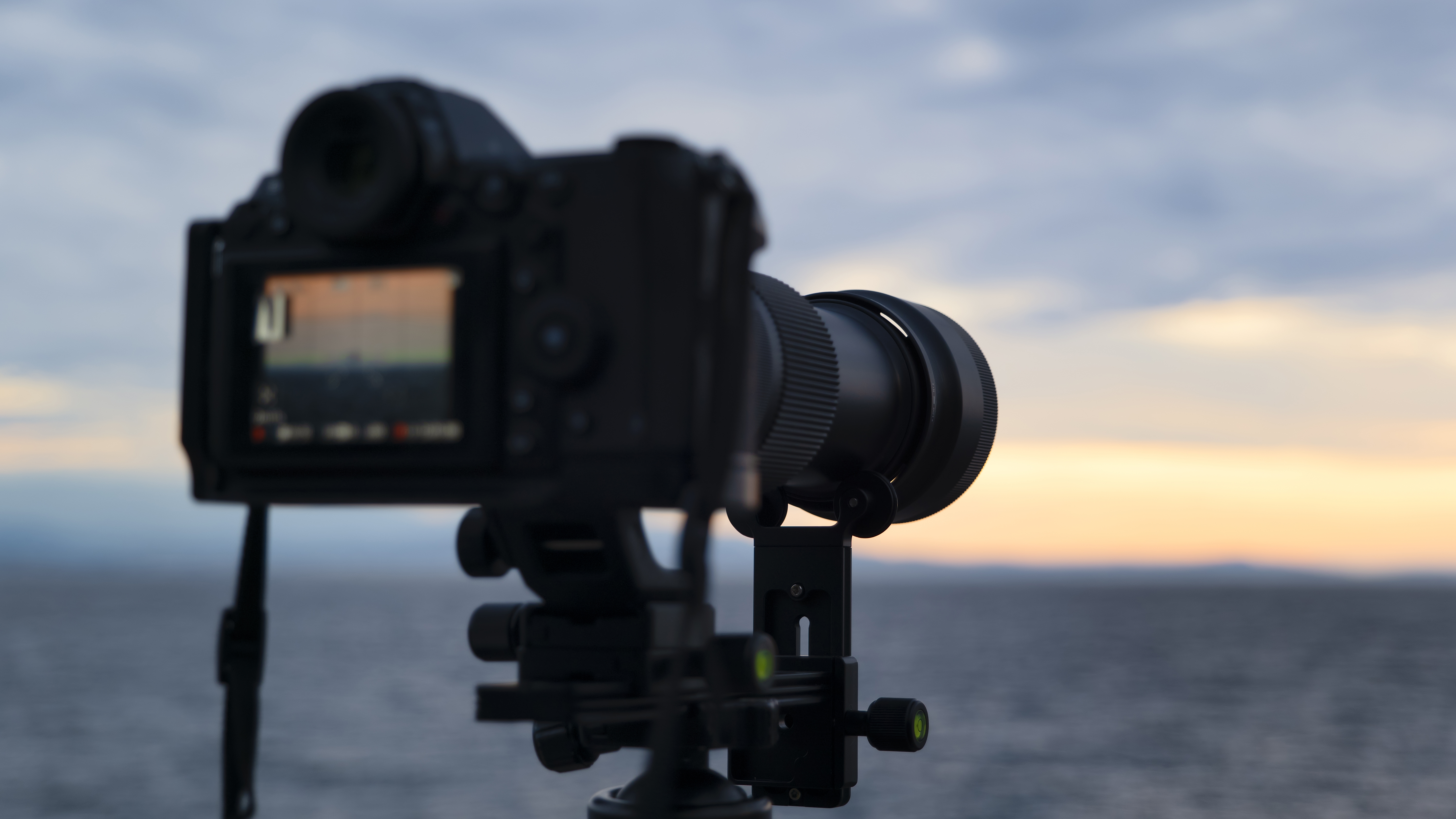 Camera with telephoto lens attached