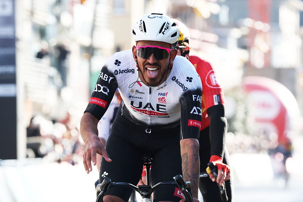 Colombia&#039;s Sebastian Molano of UAE Team Emirates celebrates after winning the &#039;Classic Brugge-De Panne&#039; men&#039;s elite one-day cycling race, 195,6 km from Bruges to De Panne in De Panne, on March 26, 2025. (Photo by KURT DESPLENTER / Belga / AFP) / Belgium OUT