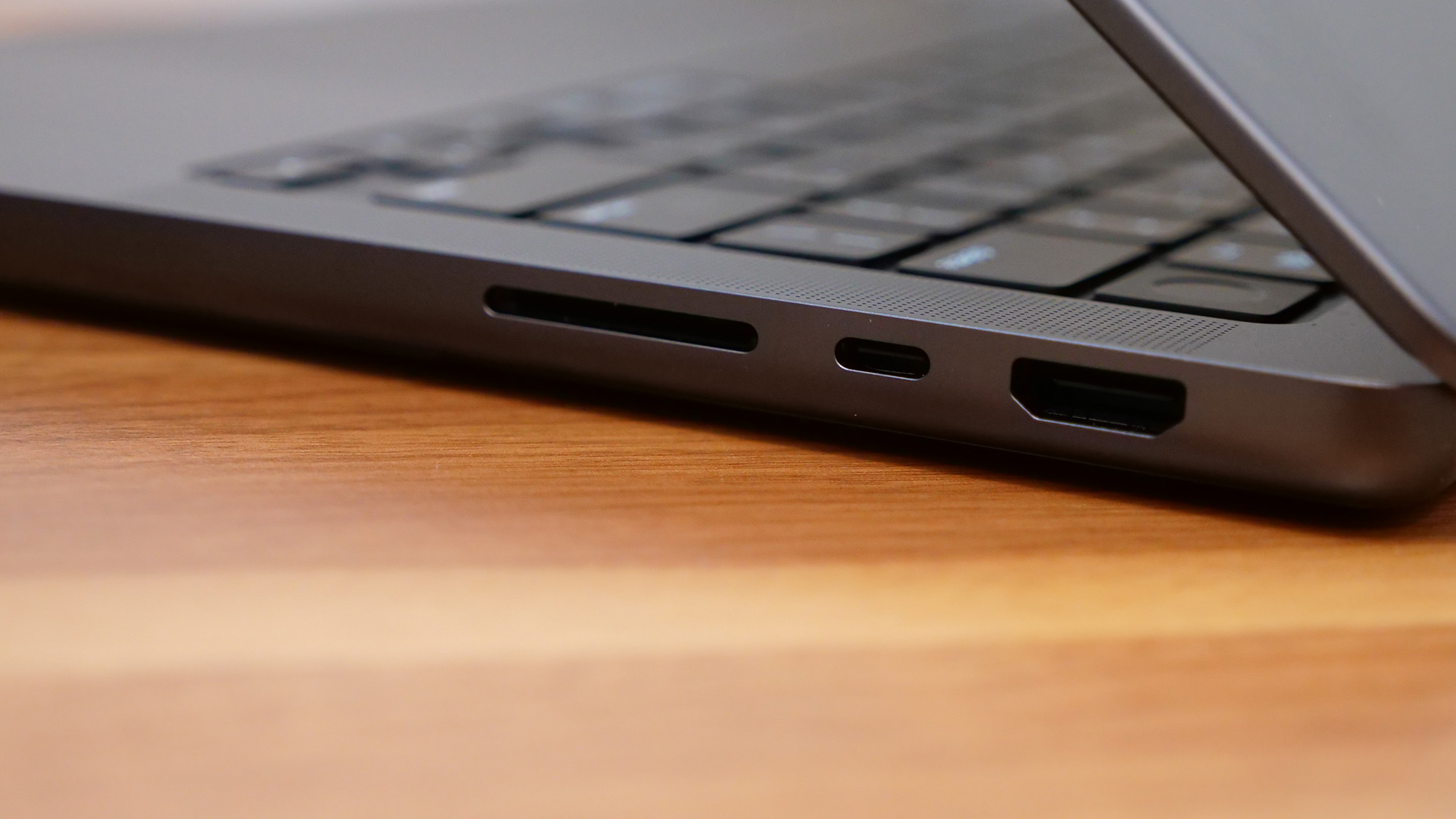 Apple MacBook Pro 14-inch M4 2024 on a wooden desk