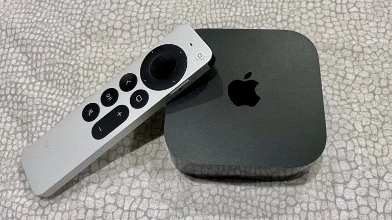 An Apple TV 4K on the ground.