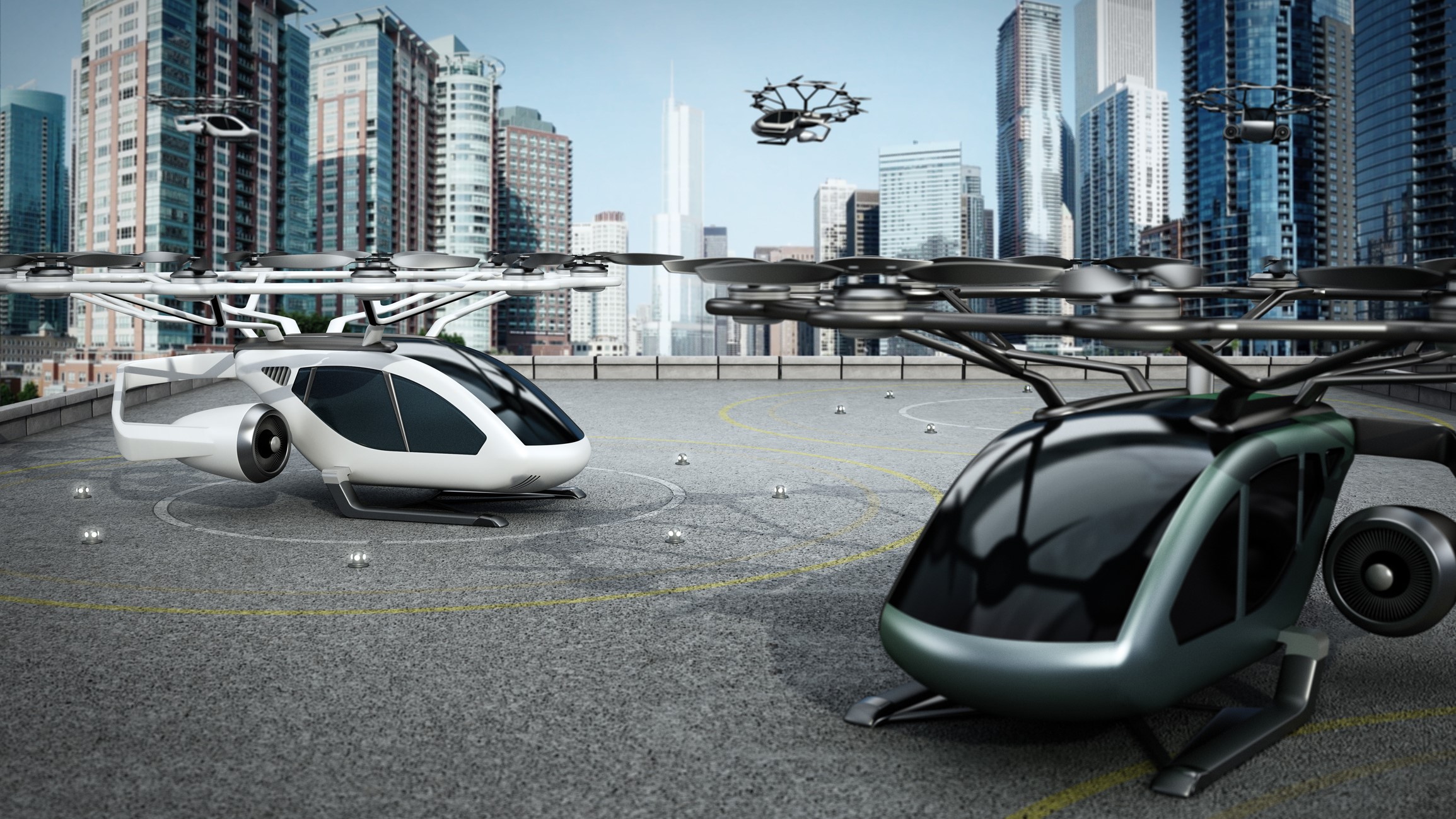 A conceptual image of flying cars taking off and parking on a helipad among skyscrapers.