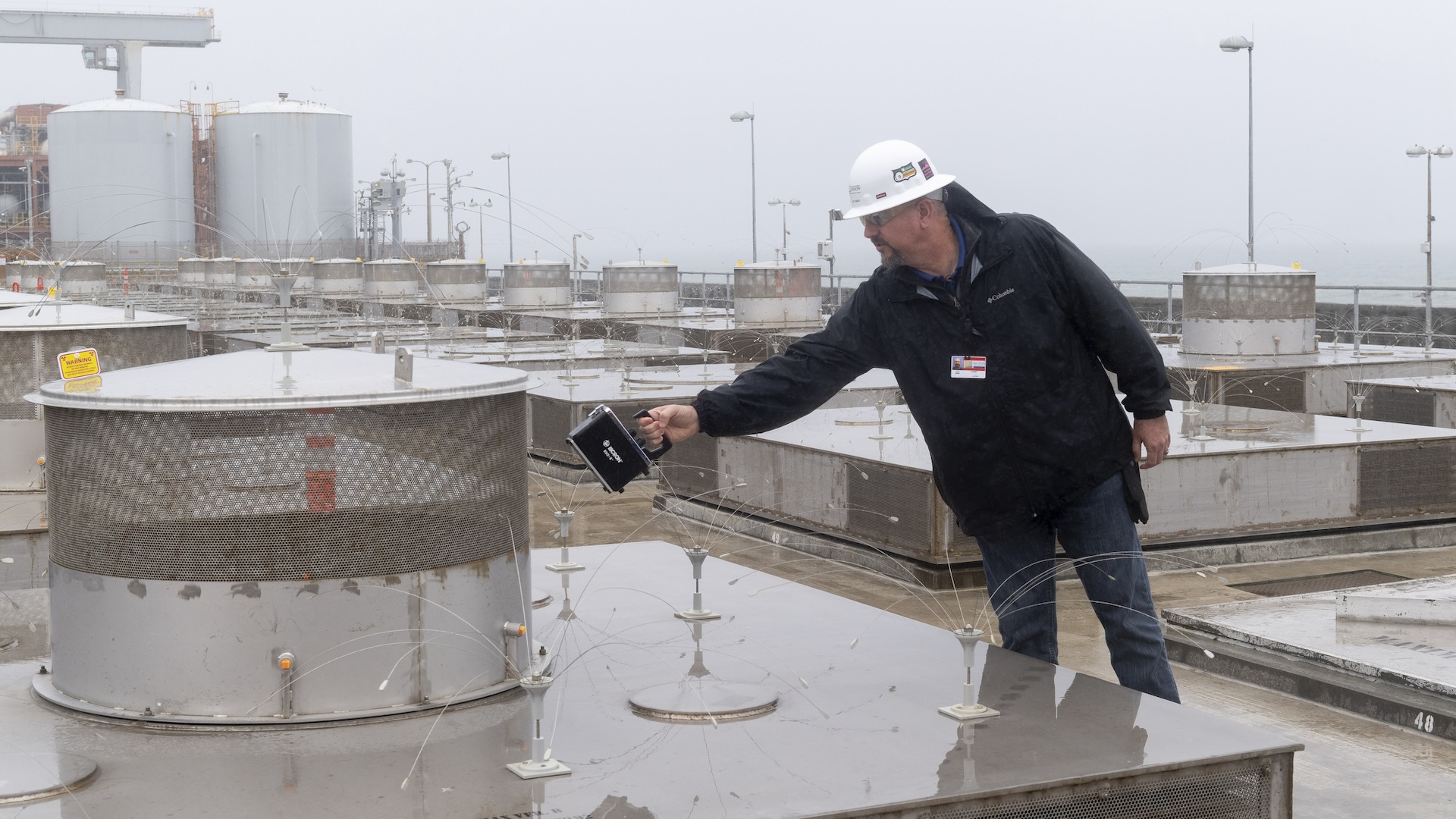 Radiation Detection Manager Jeff Carey, with Southern California Edison, takes a radiation reading at the dry storage area during a tour of the shuttered San Onofre Nuclear Generating Station south of San Clemente, CA