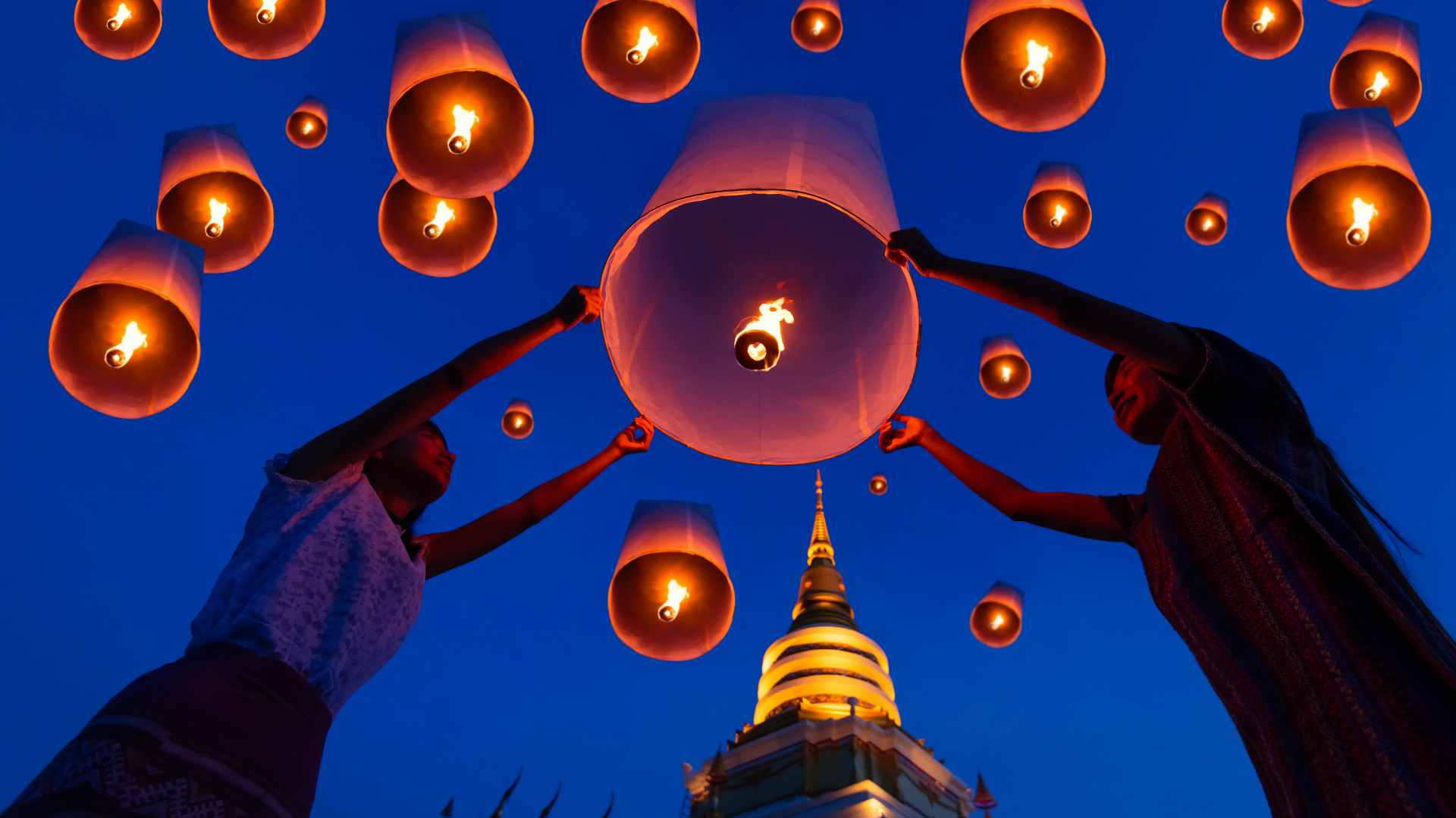 Thai people floating a lamp in Yee Peng festival in Chiang Mai,Thailand.