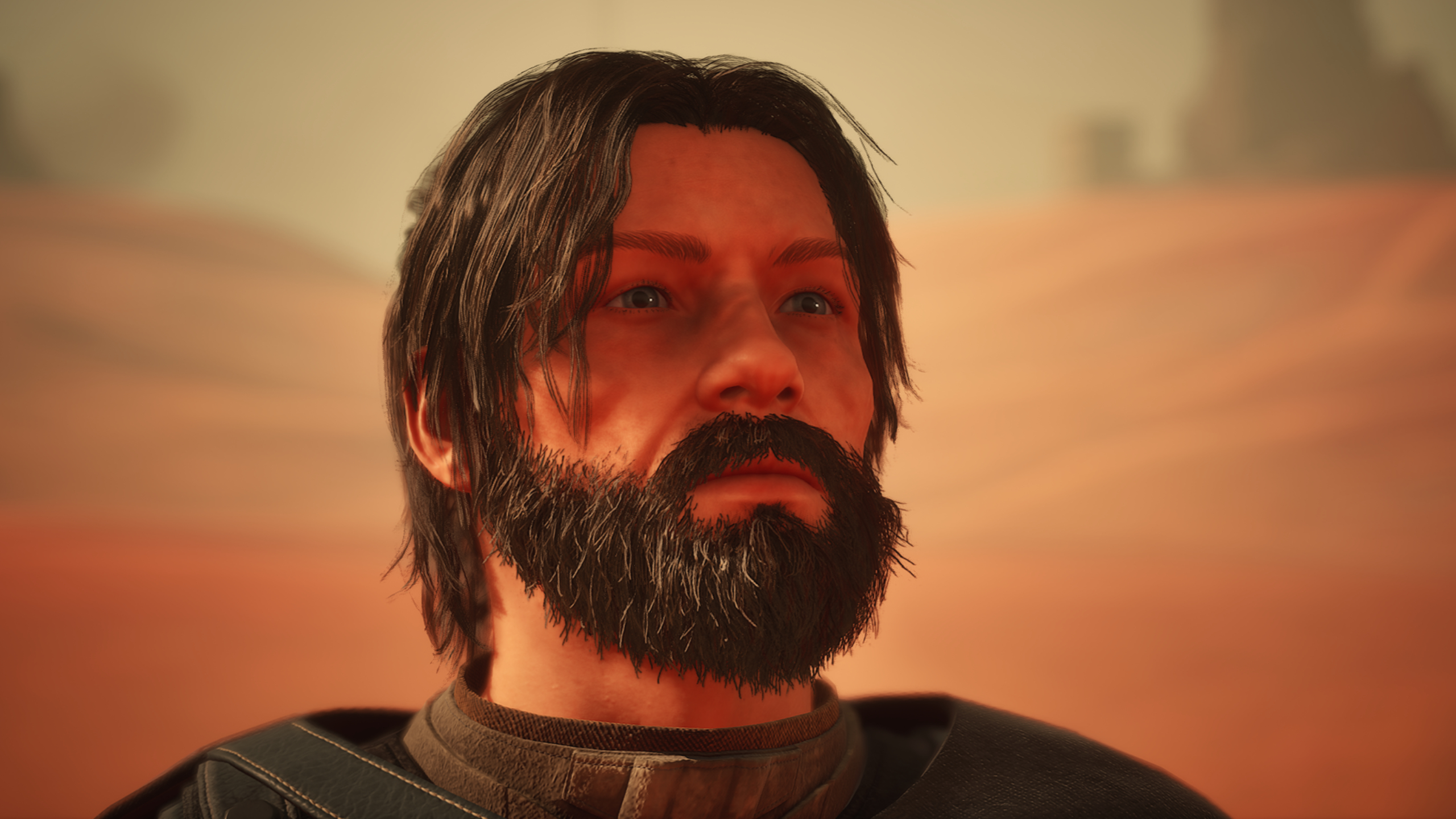 Dune: Awakening erythrite crystals - A close-up shot of a masculine character with a thick beard looking up slightly.