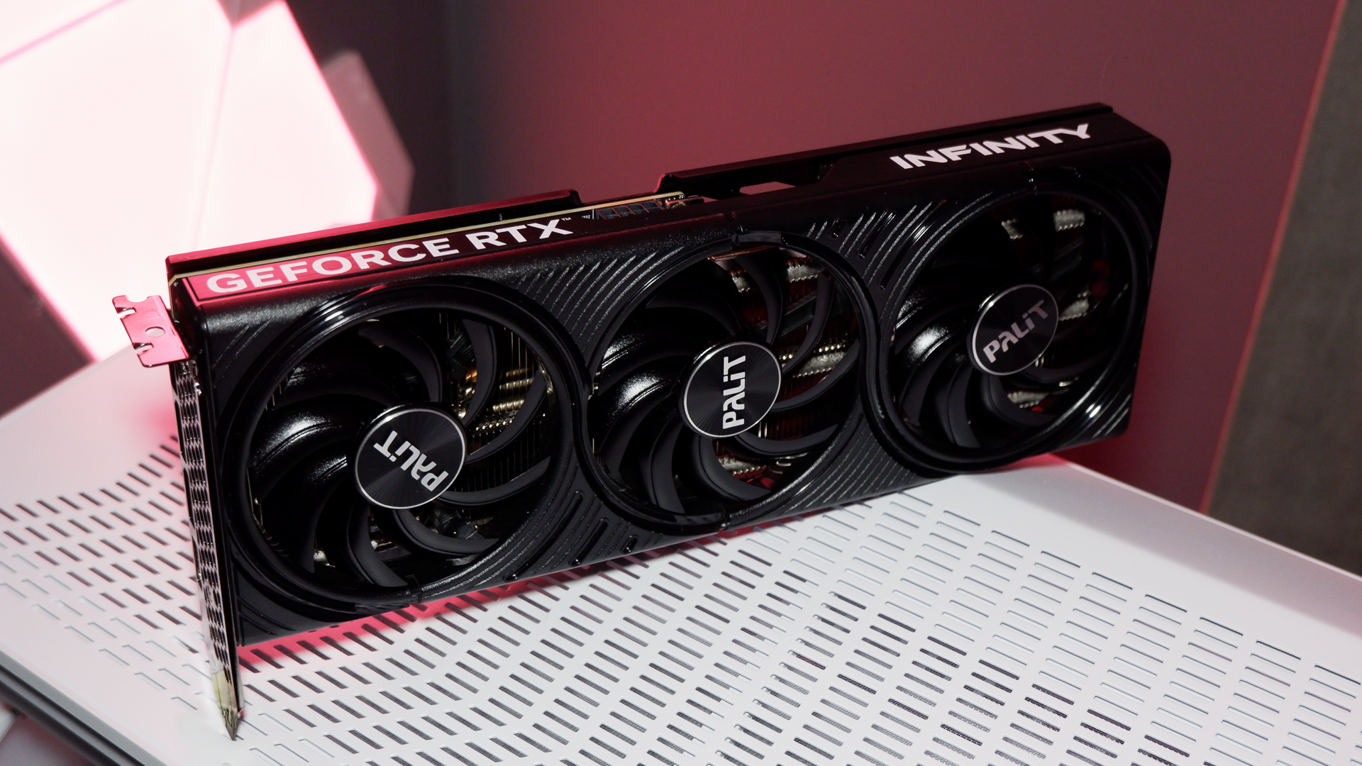 A Palit RTX 5060 Ti Infinity 3 with three fans and 16 GB of memory on a computer.