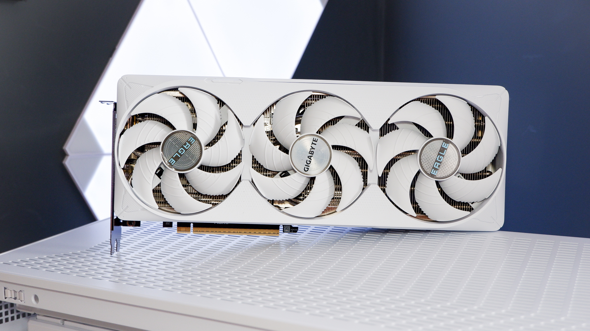A Gigabyte RTX 5070 Ti Eagle OC Ice on a desk and installed in a gaming PC. 
